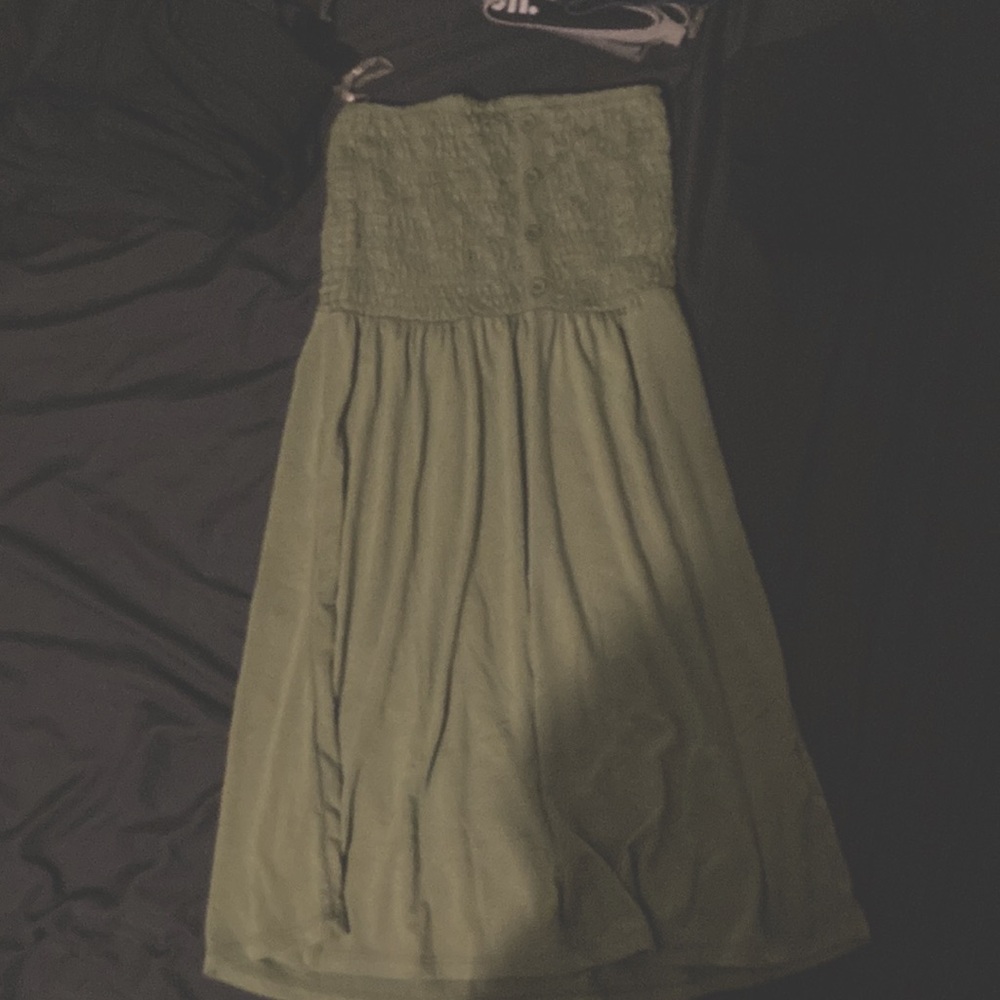 Tube top dress olive color.never been worn & still has the tags attached.